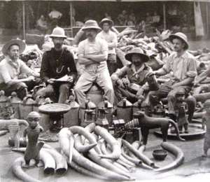 British soldiers of the infamous Punitive Expedition of 1897 proudly posing with the looted Benin artefacts. 