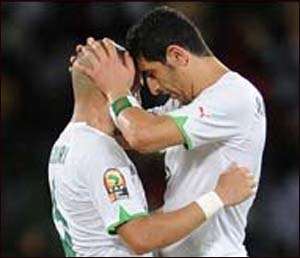 Algeria's Rafik Halliche right celebrates his goal against Mali