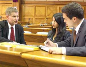 Elise Postigo (middle) and Rob Withagen (right) with Mr Solheim (left)