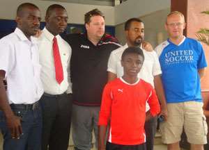 United Soccer Training Academy officials in a photograph with officials of W-Consult in Kumasi
