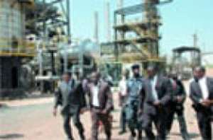 Dr Oteng-Adjei second left, the Minister of Energy and other directors inspecting the plant at the refinery during a working visit.