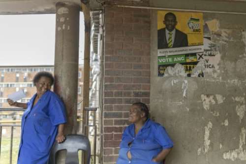 An ANC poster still clings to a wall after the 