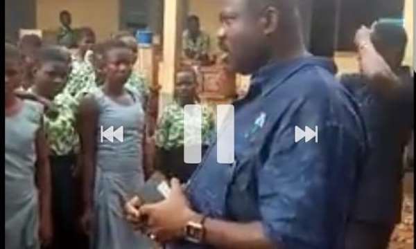 Joshua Akamba interacting with the Tempane SHS students