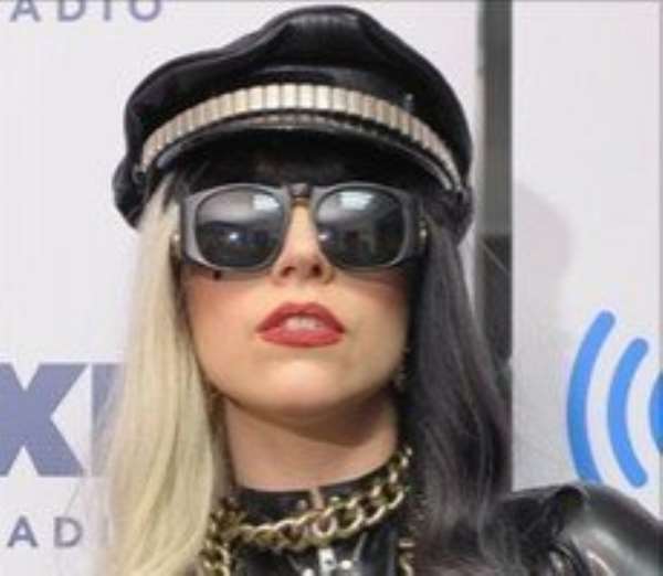 Lady Gaga falls off stage while dancing with fan during Las Vegas show