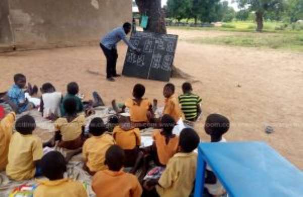 Kaasi Primary School Pupils Sit On Bare Floor To Study