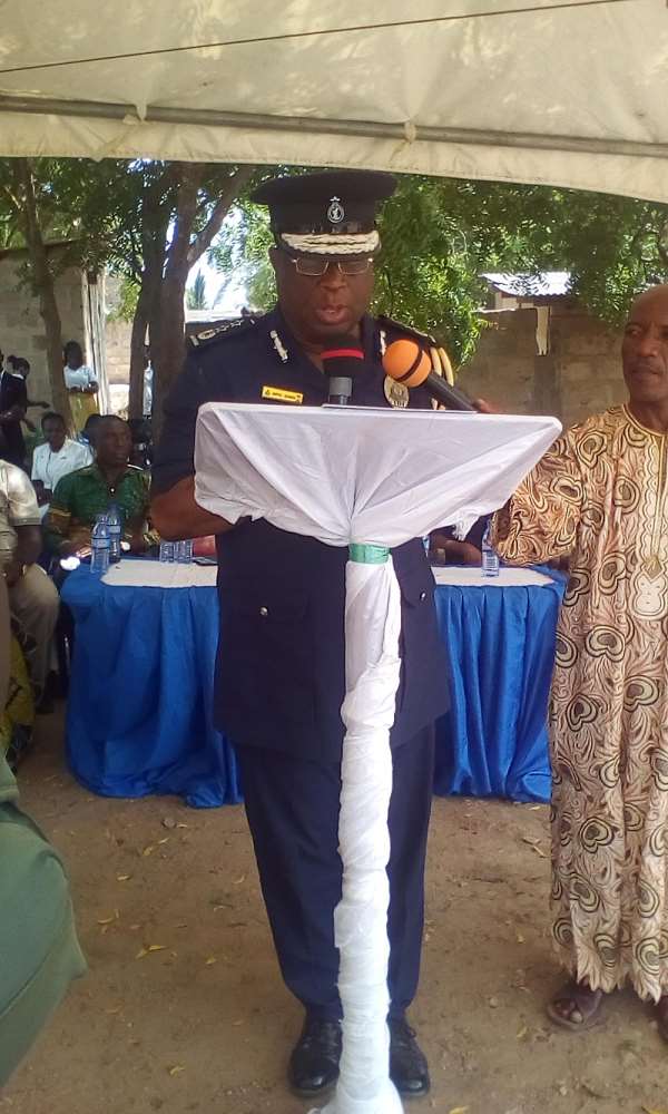 COP Rev. Neenyi Ampah-Bennin (Below) And The Newly Built Police Station (Above)