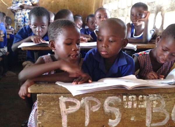 Children reading in school - Source: Wikimedia Commons