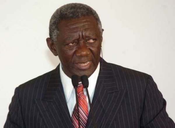 Kufuor file past Rawlings body