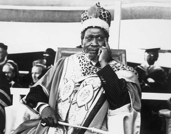 President Jomo Kenyatta, wearing a gold and scarlet robe and leopard cap, is installed as Chancellor of the University of Nairobi in December 1970.
- Source: Getty Images
