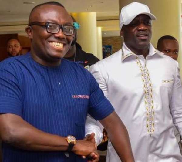 Akon (right) in a pose with Bola Ray