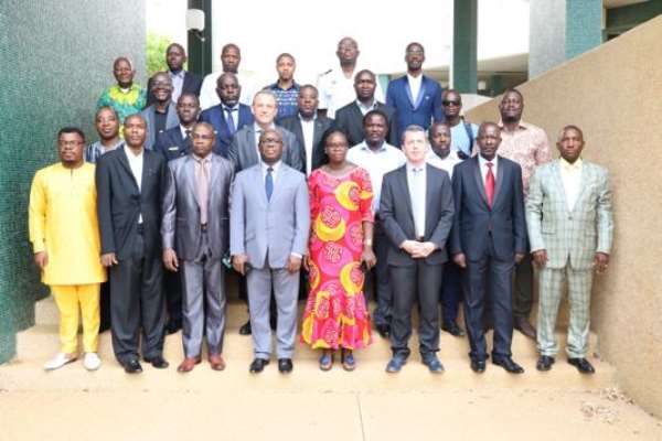 Participants and officials in a group photograph