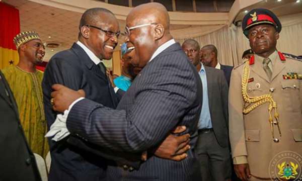 President Nana Akufo-Addo (R) sharing a laughter with Speaker Alban Bagbin (L)