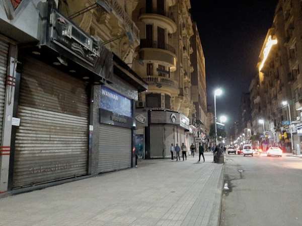 A deserted street in Cairo after the government ordered the closure of shops, restaurants and cafes. - Source: Photo by Ziad Ahmed/NurPhoto via Getty Images