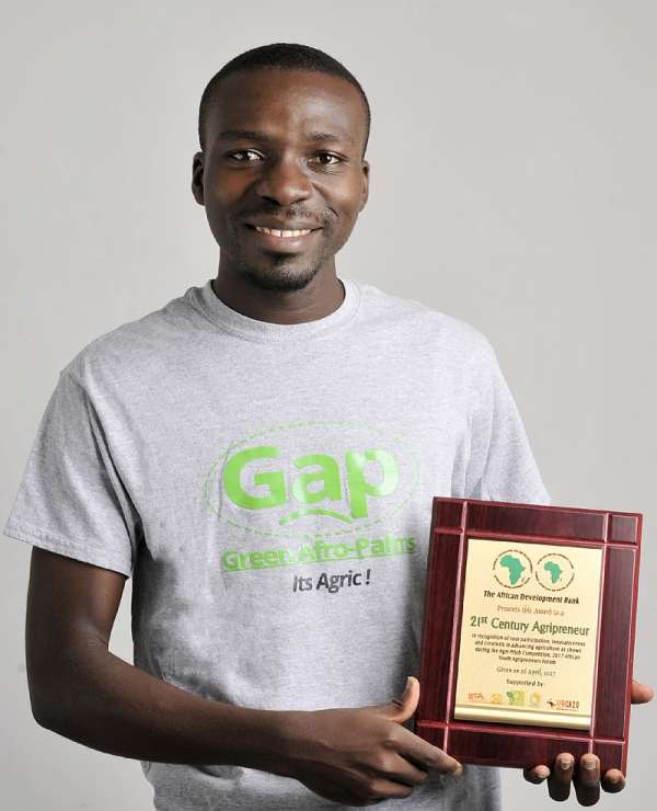 Kwame Ababio With His Award