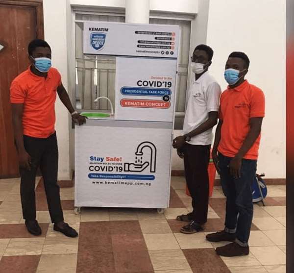The Twins Are Pictured Wearing Orange As They Stand By The Device With Kematim Concepts Colleague Paul