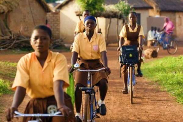 Schoolgirls on bicycles in Ghana, photo credit: UNICEF