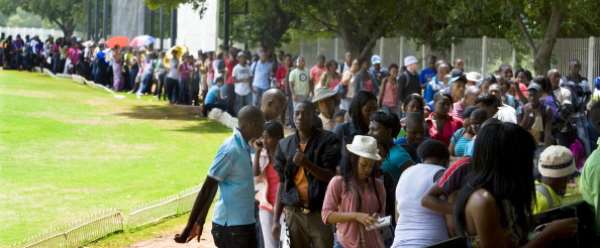 Young people wait to register at a South African university in 2012. They are bearing the brunt of high levels of unemployment. - Source: Photo by Foto24/Gallo Images/Getty Images