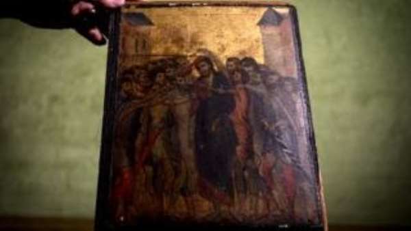 The painting had been hung above a hotplate in a kitchen in the French town of Compiegne
