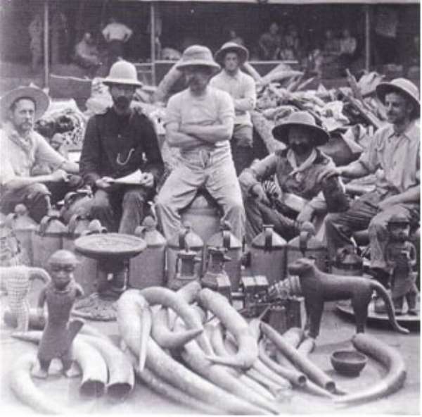 Members of the British Punitive Expedition which invaded Benin in 1897 posing proudly with the Benin artefacts they looted.