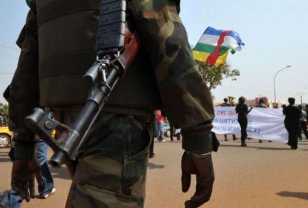 A soldier ensures security during a women's march in Bangui against the current conflict, on December 28, 2012. By Sia Kambou (AFP)