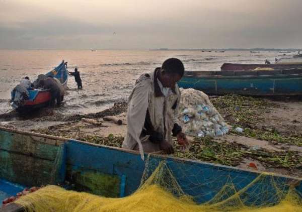 Catching more than fish: Ugandan town crippled by AIDS