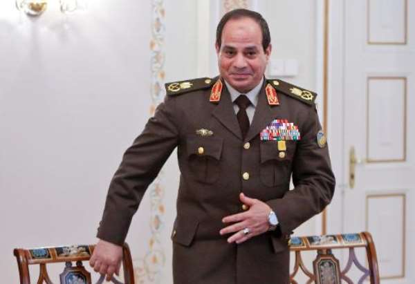 Former Egyptian army chief Abdel Fattah al-Sisi attends a meeting with Russian President Vladimir Putin in Novo-Ogaryovo, outside Moscow, on February 13, 2014. By Maxim Shemetov (AFP/File)