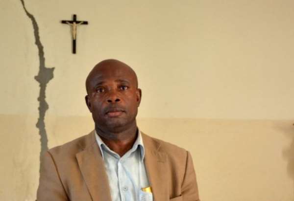 Emmanuel Mba Bekale speaks about the unexplained death of his daughter, in Libreville, on October 26, 2012. By Patrick Fort (AFP/File)