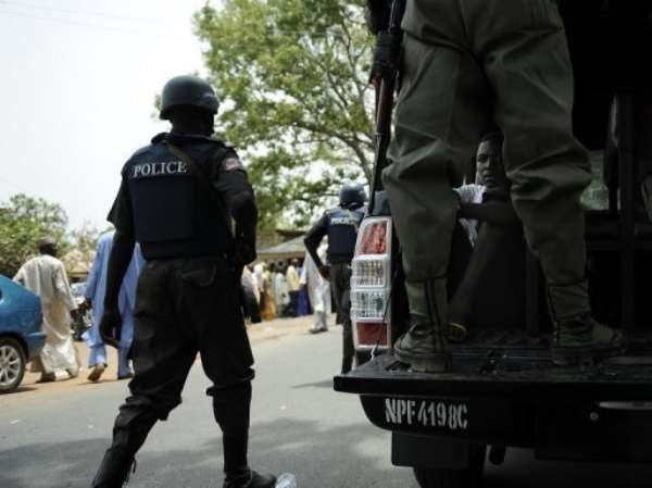 Nigerian police patrol the northern town of Bauchi in April 28, 2011. By Tony Karumba (AFP/File)