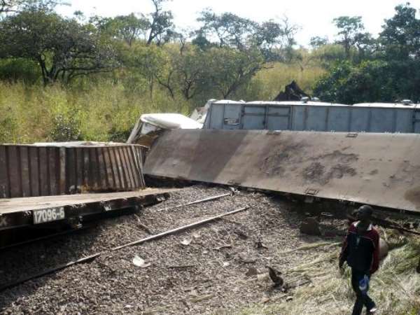 This picture taken on April 22, 2014 shows derailed wagons after a train sped off the rails in the southern province of Katanga, Democratic Republic of Congo. By Numbi Mathys (AFP)