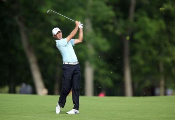 Charl Schwartzel of South Africa hits his second shot on the par 4 13th hole on May 30, 2013, in Dublin, Ohio. By Andy Lyons (Getty Images/AFP)
