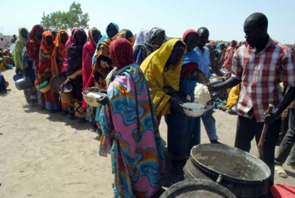 Internally Displaced People queue to be served with food at Dikwa Camp in Borno State in north-eastern Nigeria on February 2, 2016. By (AFP/File)