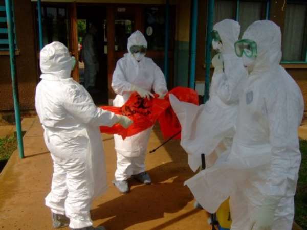 Kampala residents are striving to follow advice to avoid touching during the ebola outbreak. By Isaac Kasamani (AFP)