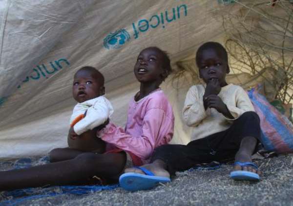 South Sudanese refugee children are seen at a camp run by the Sudanese Red Crescent on January 27, 2014 in the western part of Sudan's White Nile state, about 30 kilometres from South Sudan. By Ashraf Shazly (AFP)