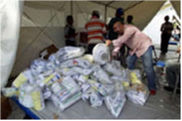 Ballots from Haiti's presidential election on 28 November 2010 being sorted in Port-au-Prince