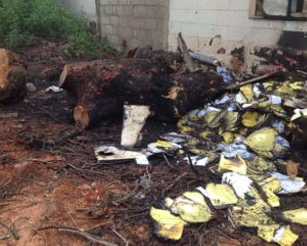 Partially burnt medical records of patients scattered on the scene after the fire which burnt the Diabetic Centre at the Korle Bu Teaching Hospital yesterday