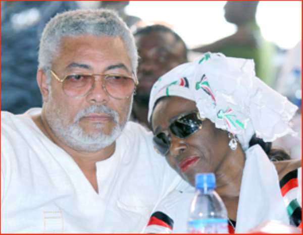 ·Nana Konadu resting on Rawlings' shoulder