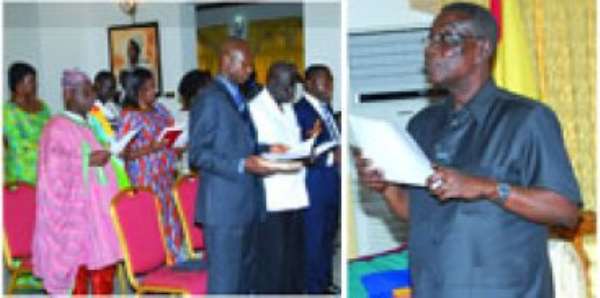 President J.E.A Mills administering the oath to the board members of SADA.