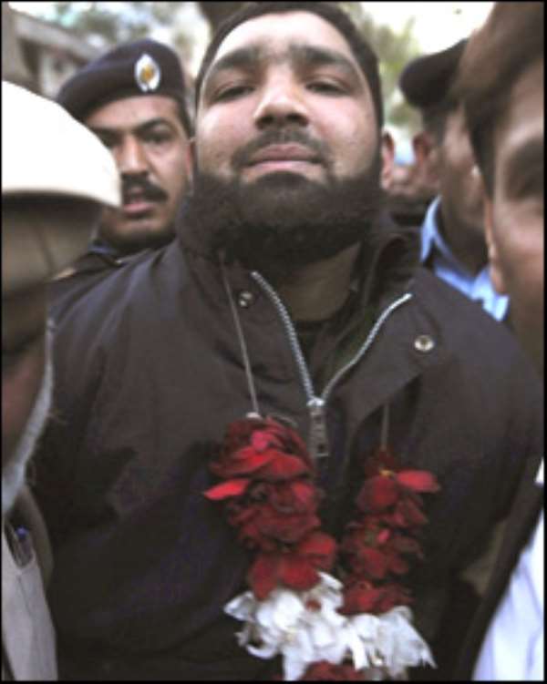 Killer Qadri Garlanded