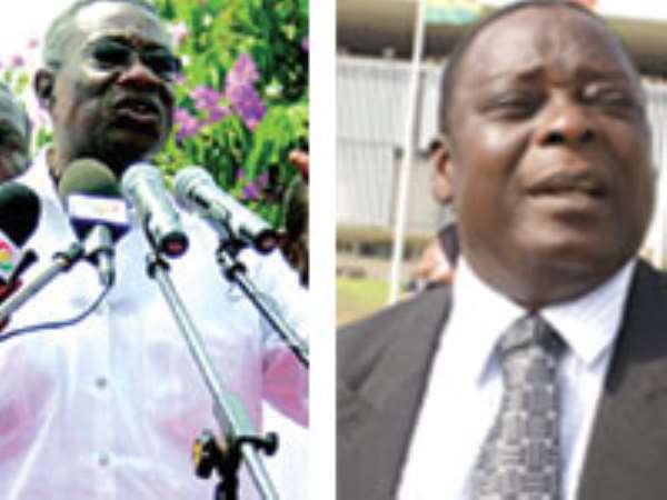 President John Evans Atta Mills (left), Mr. Mark Woyongo, Upper East Regional Minister (right)