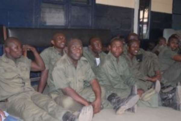Some security guards of the Ghana Atomic Commission who were arrested by the police