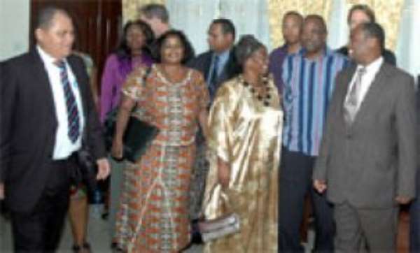 Deputy Chairman of the Electoral Commission, Mr Safo Kantanka (2nd right) in a group photograph with members of the Mozambican delegation which paid a courtesy call on the offices of the Commission as part of their working visit to Ghana.