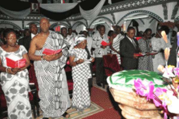 Vice-President Kwesi Amissah-Arthur (middle) and wife Matilda (left), at the service.