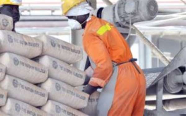 GHACEM workers packing bags at the company's factory in Tema