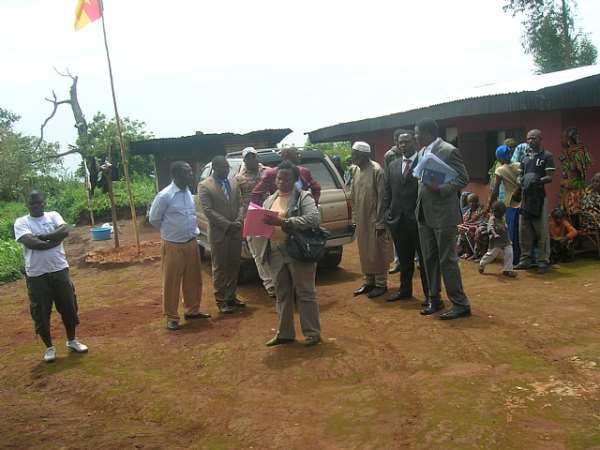 Registrar Bamenda Court of First Instance takes notes during Locus while Magistrate Achu listens to Ardo Adamu Bi Mamada