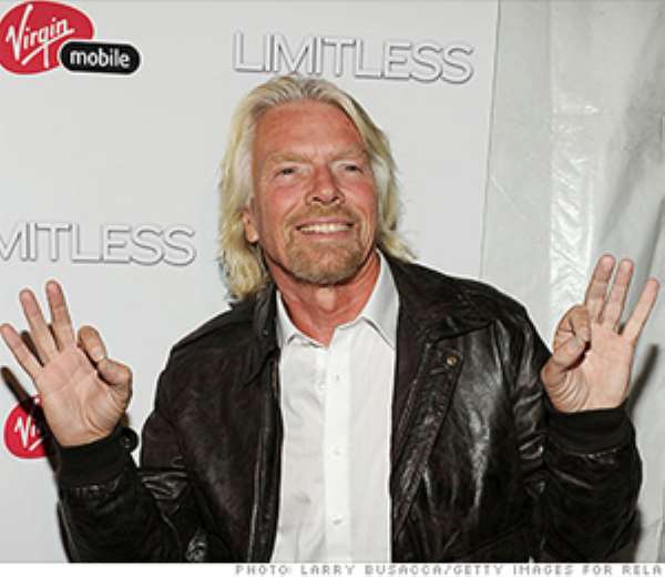 Why is Richard Branson smiling? Because he's got an iPhone, baby!