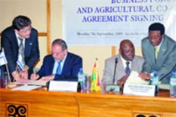 Alhaji Muhammad Mumuni (2nd right), the Minister of Foreign Affairs and Regional Integration, and the Deputy Prime Minister and Minister of Foreign Affairs of Israel, Mr Avigdor Liberman (2nd left), signing the agreement and the joint declaration.