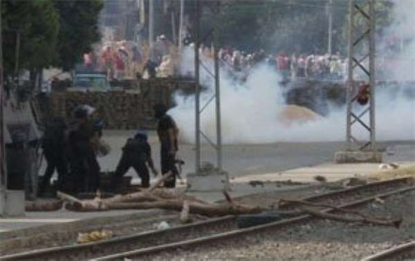 Egyptian security forces throw tear gas towards supporters of ousted Islamist President Mohammed Morsi at a sit-in in Cairo, Egypt – 14 AugustTear gas was fired as armed bulldozers moved in