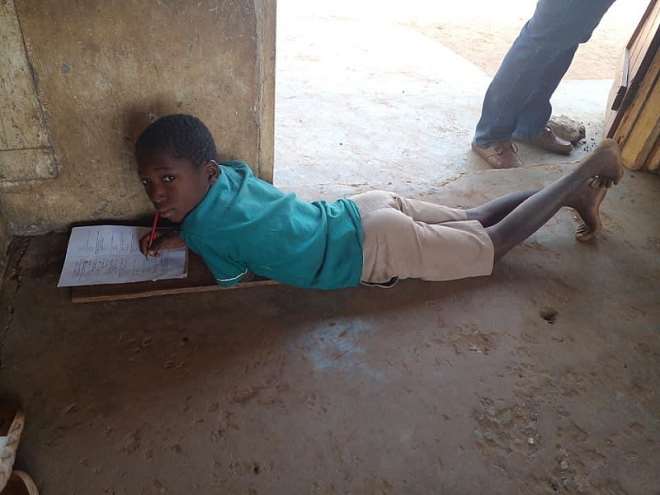 1282021110141-l5hsk8v331-school-children-lie-on-bare-floor-3.jpeg