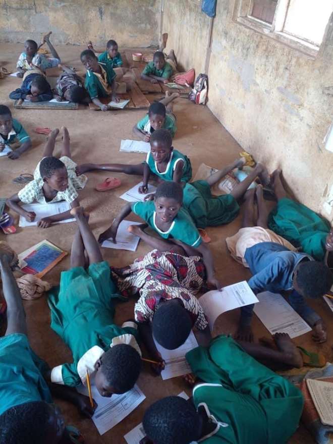 1282021110142-1i841p5bbv-school-children-lie-on-bare-floor-6.jpeg