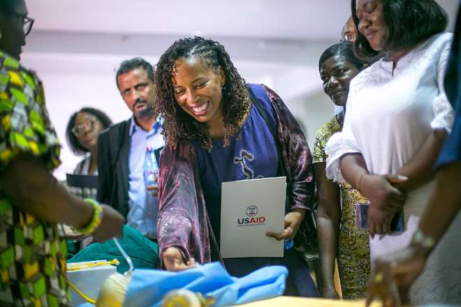 USAID / Ghana Health Unit Director Janean Davis is participating in a demonstration of neonatal resuscitation as taught to midwifery students.